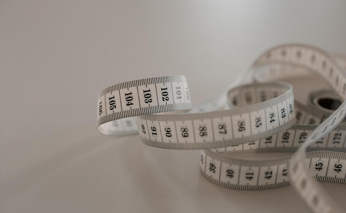 White measuring tape on the surface.