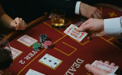 Photo of a casino table, playing blackjack.