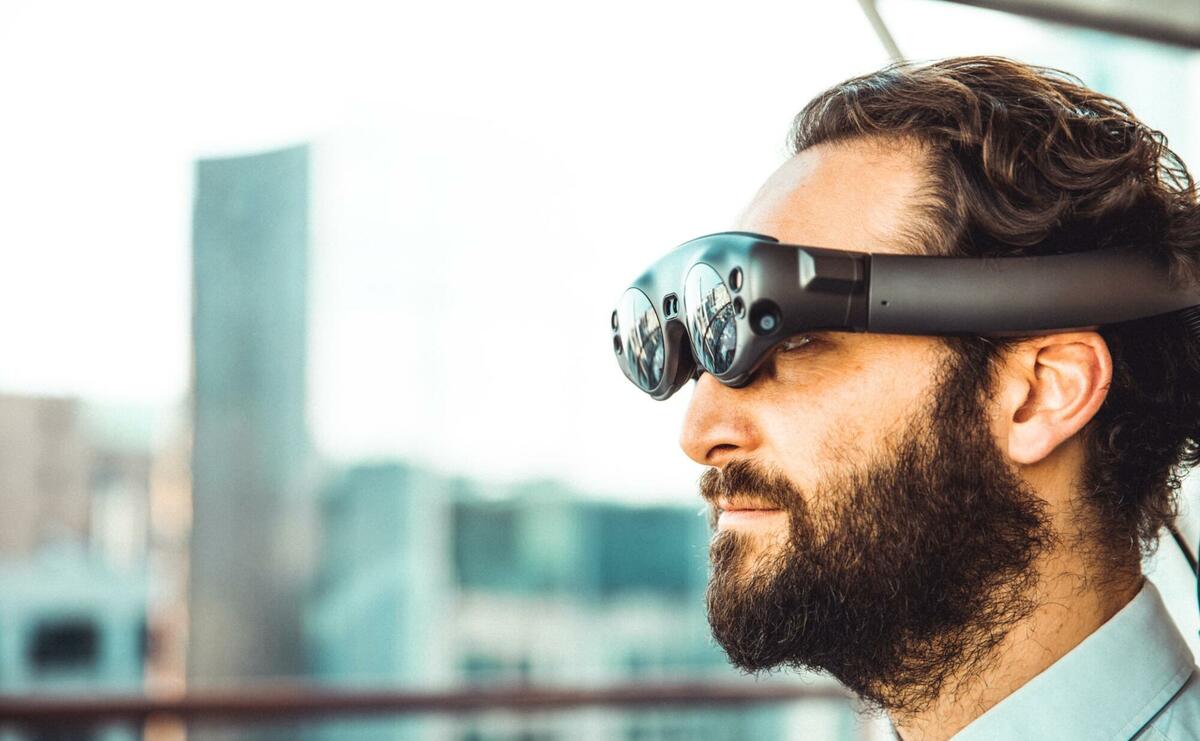 Man wearing augmented reality glasses.