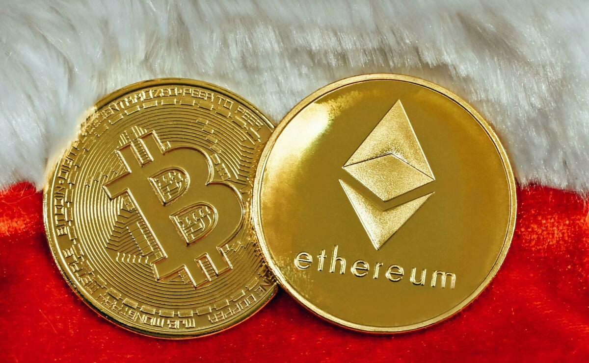 A gold looking bitcoin and ethereum coin.